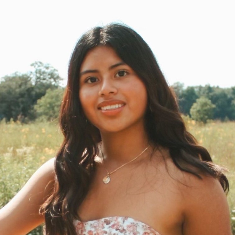 Headshot of Melanie.