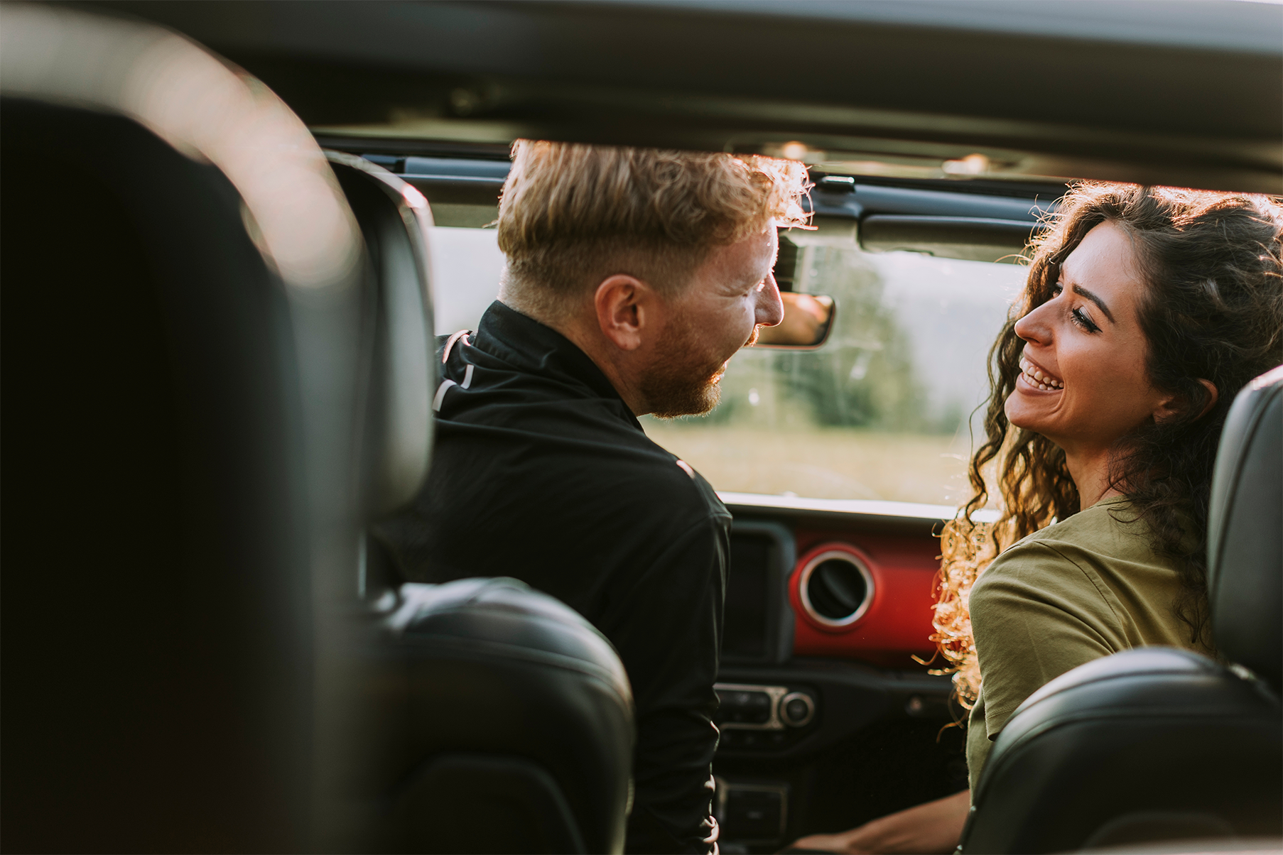 Couple having fun on a roadtrip.